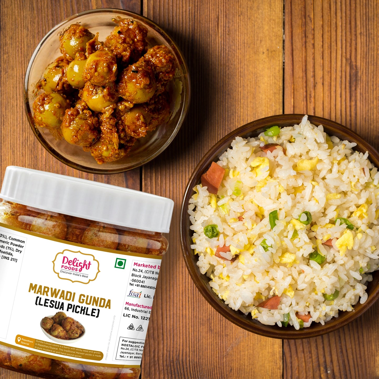 Two bowls of food and a jar labeled 'Delight Food' on a wooden surface